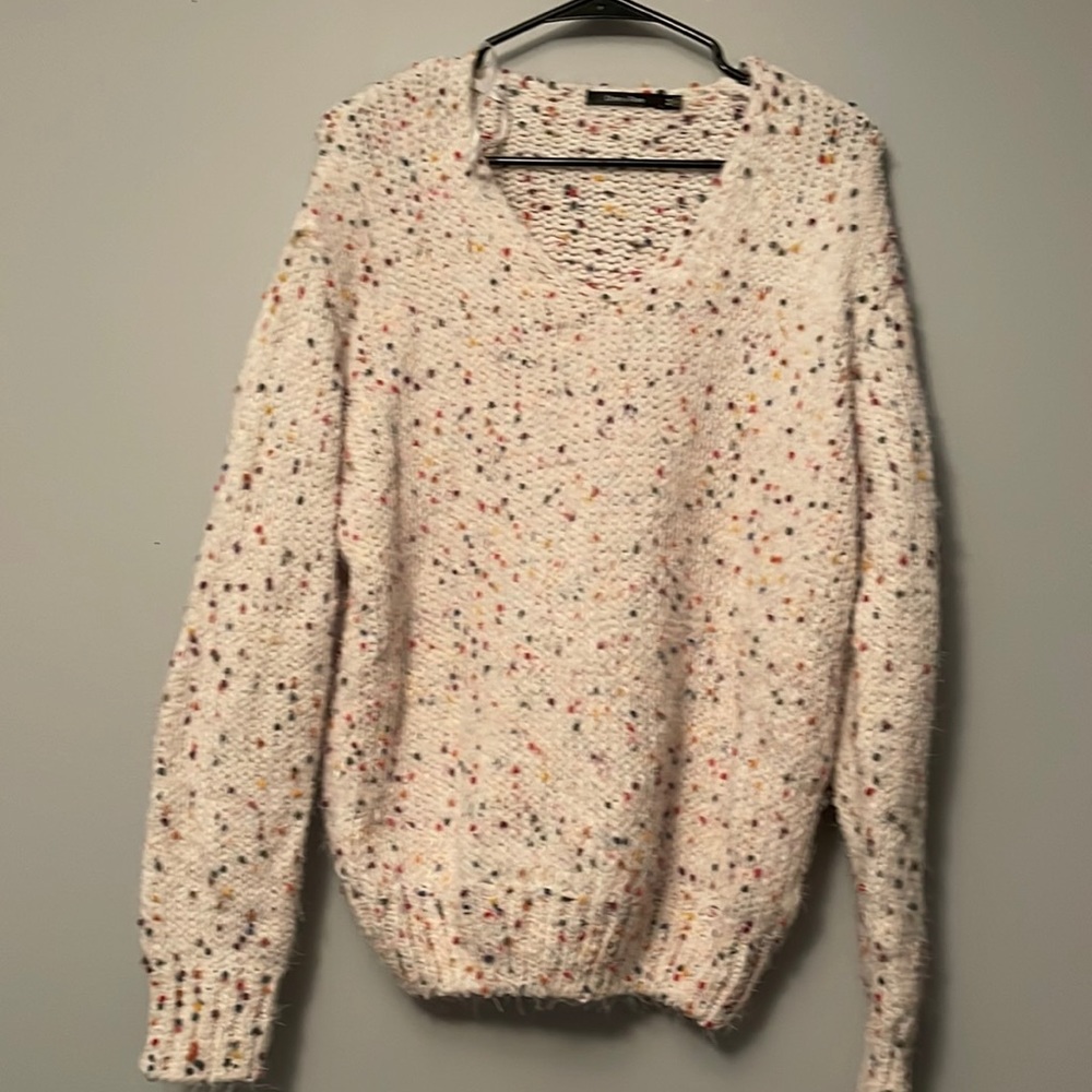 V neck popcorn sweater.